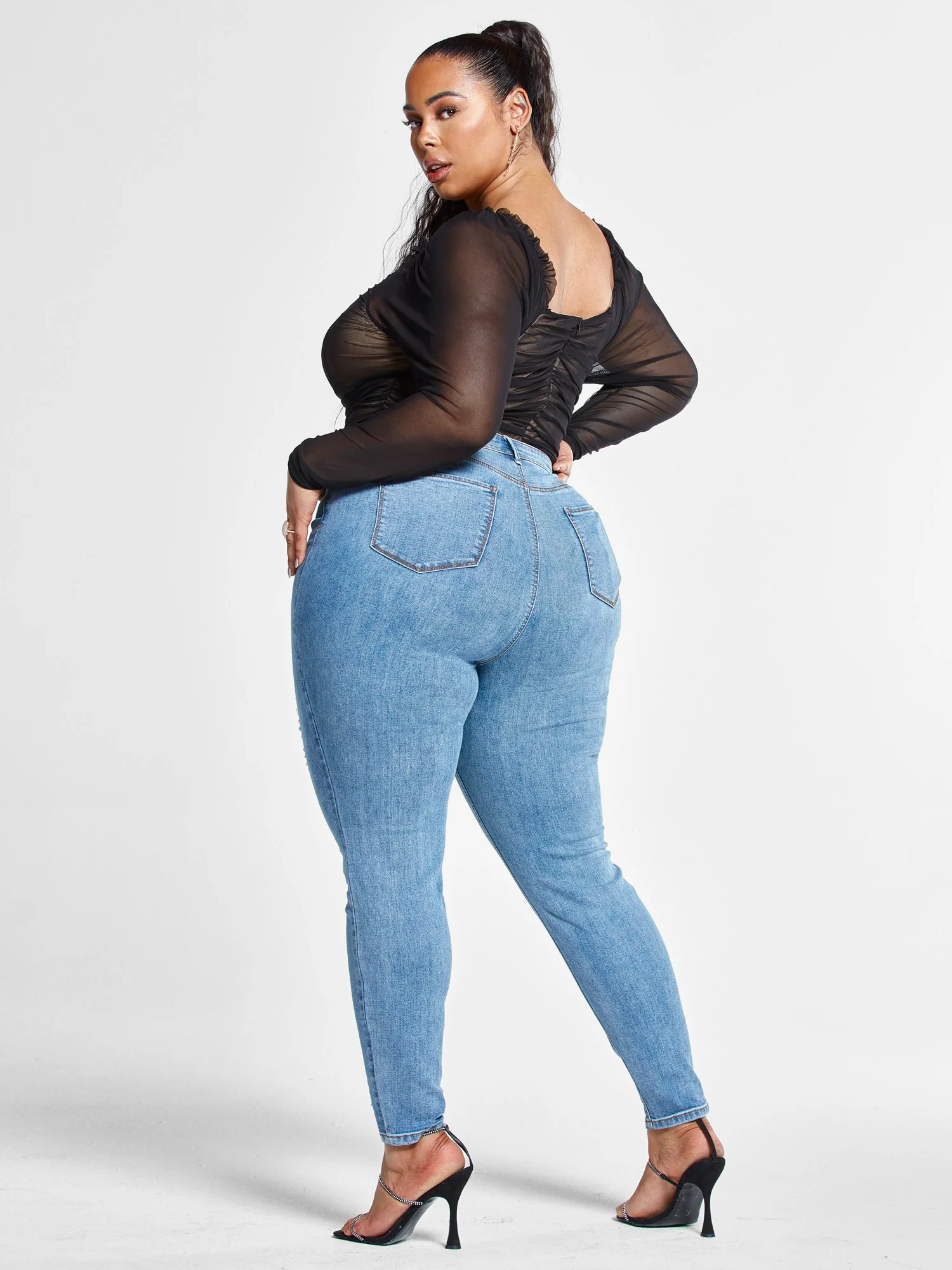 High Rise Destructed Skinny Jeans in Light Indigo - Image 4